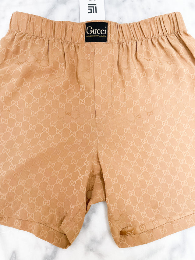 Short Gucci Monograma Tam.P